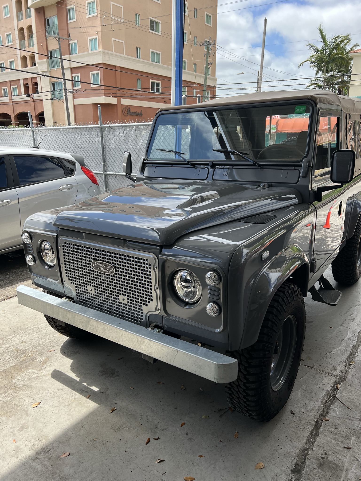 Vintage Land Rover being serviced at an automotive repair shop